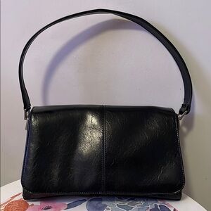 Timeless Black Leather Shoulder Bag with Curved Handle